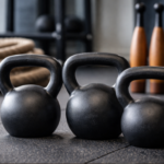 fitness items for swinging crossword clue