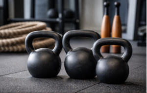 fitness items for swinging crossword clue